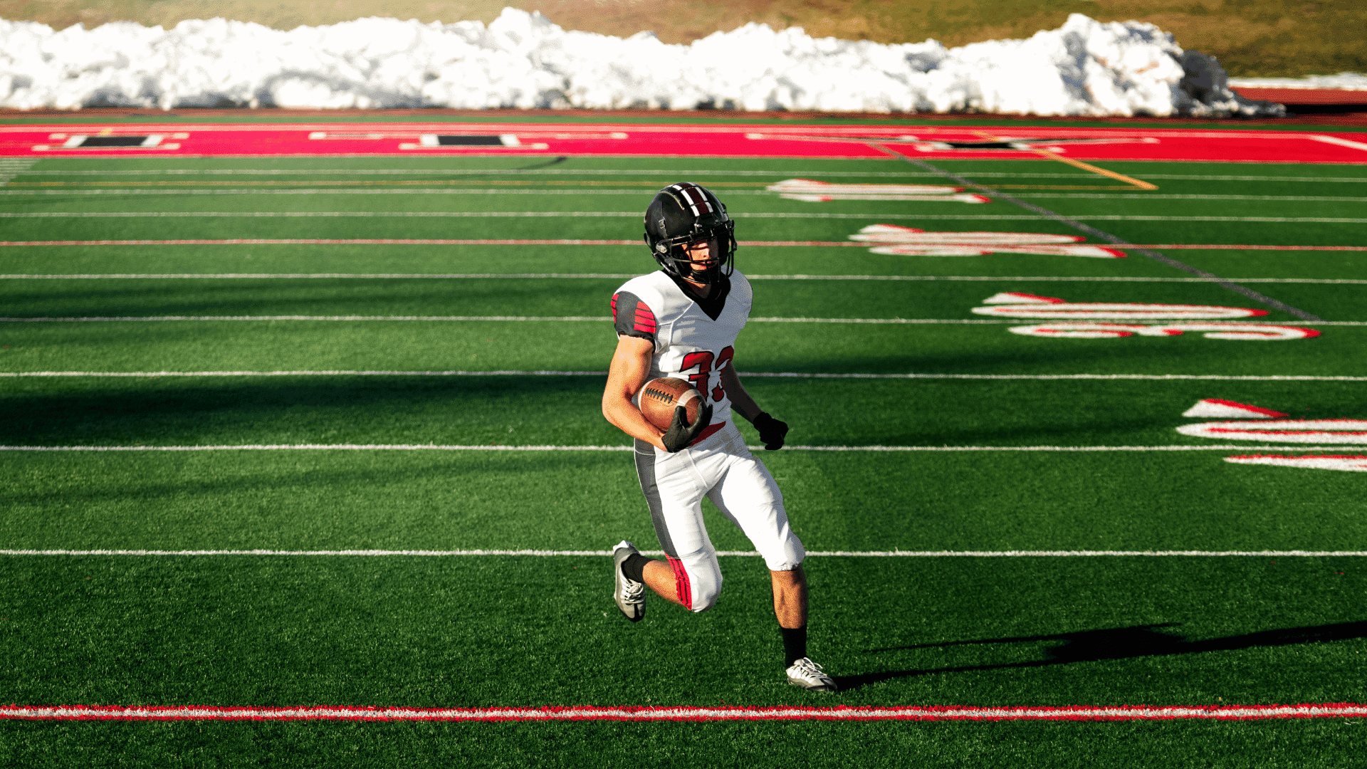 football player holding a football during practice illustrating a guide to pbu meaning in football