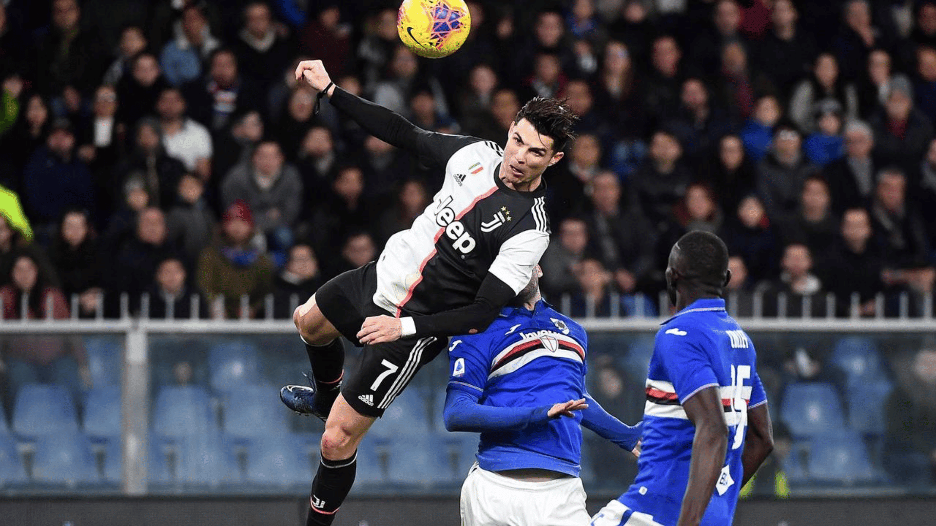 juventus ronaldo header against team high up in the air with his iconic juventus jersey