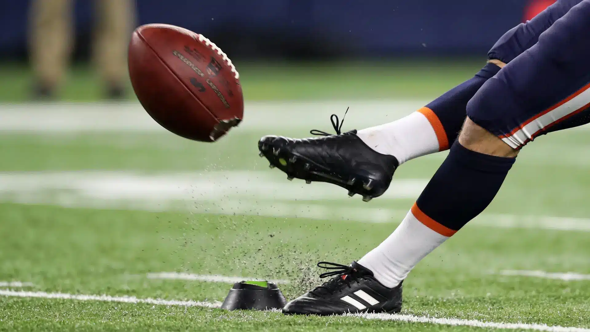 punter-striking-lower-half-of-ball