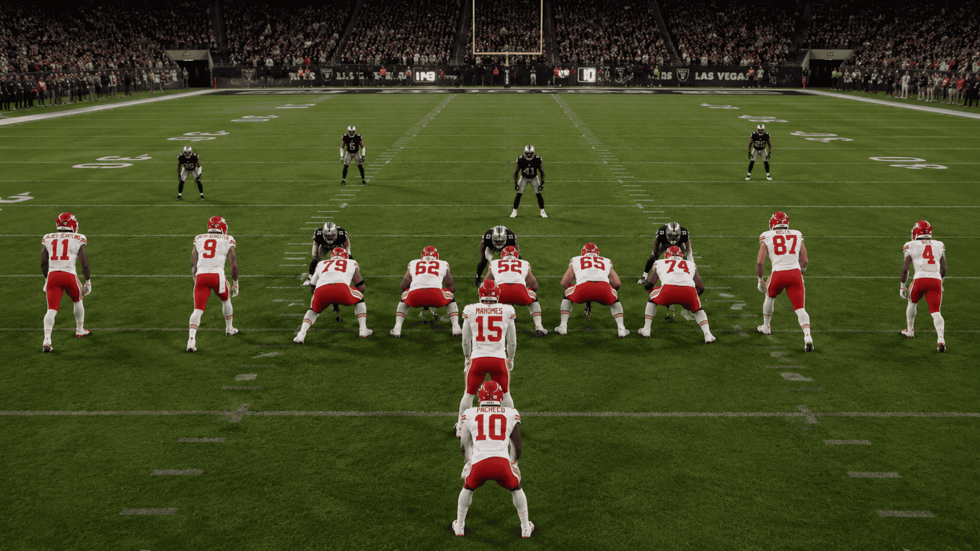 realistic nfl offense lined up in eleven personnel shotgun formation before the snap on a football field