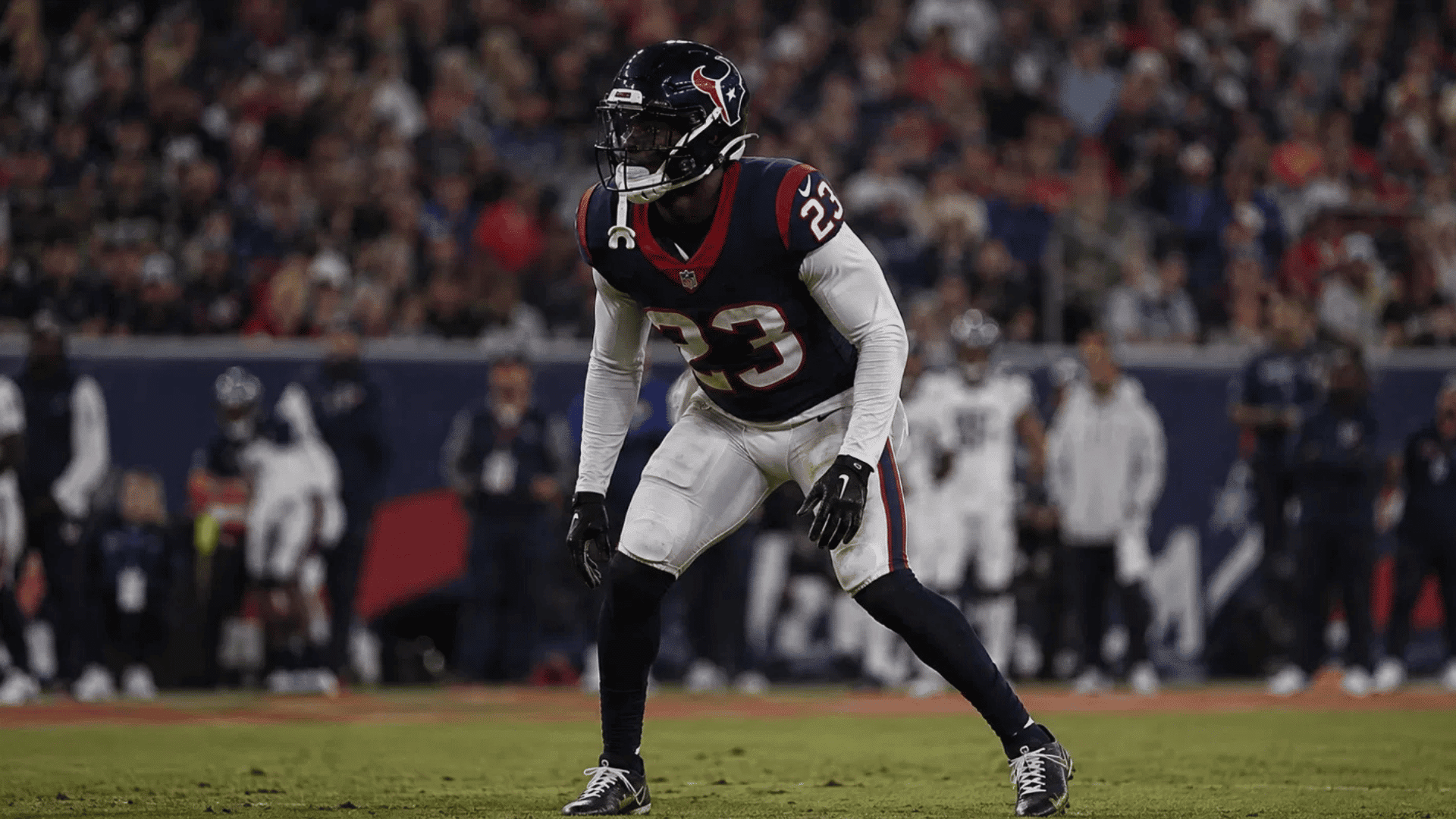 texans strong safety number 23 in a defensive stance reading the play at the line