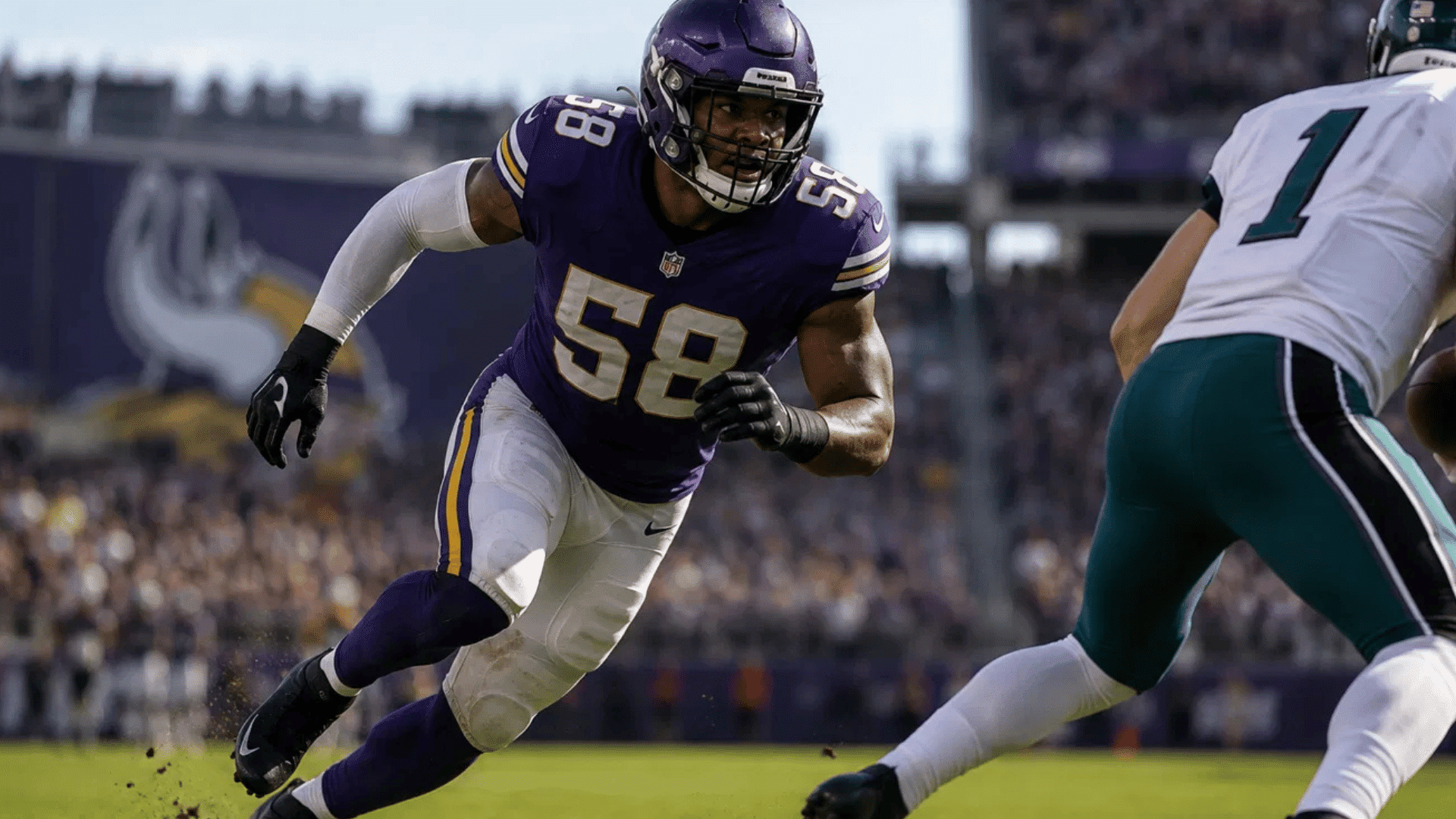 vikings outside linebacker number 58 chasing down eagles quarterback number 1