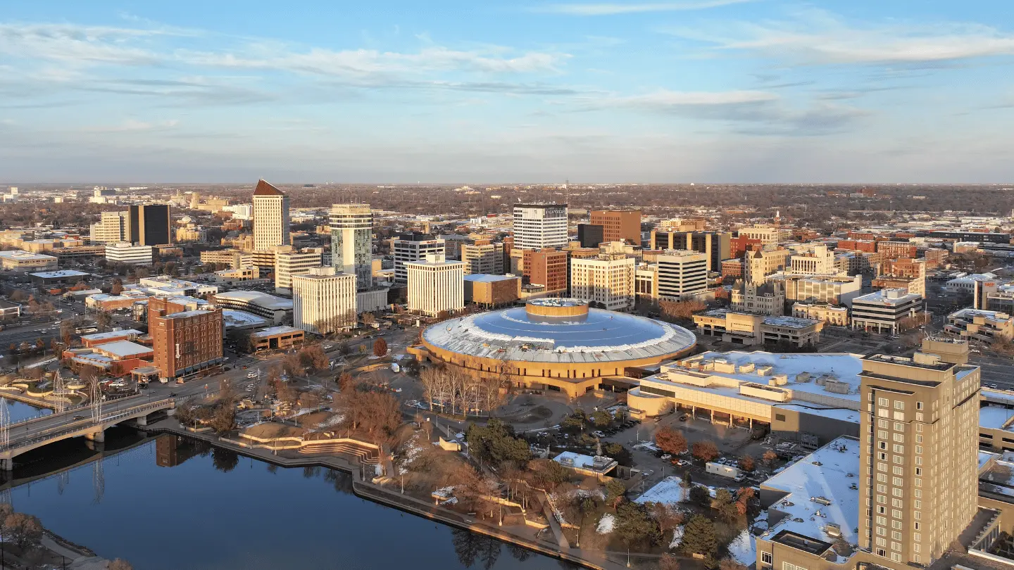 top view panoramic of the city of kansas in the glowing sunset with buildings rising high above the ground