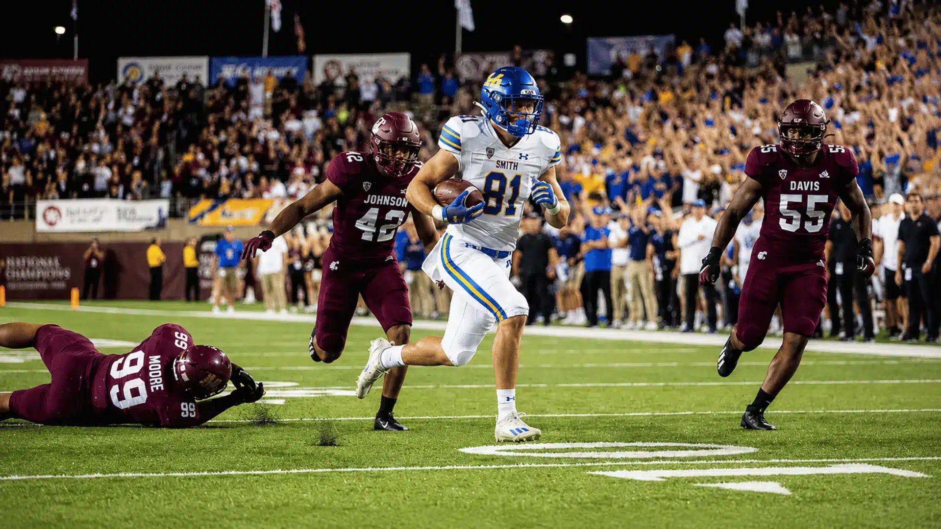 football defenders closing in on a ball carrier during a defensive play in a packed stadium