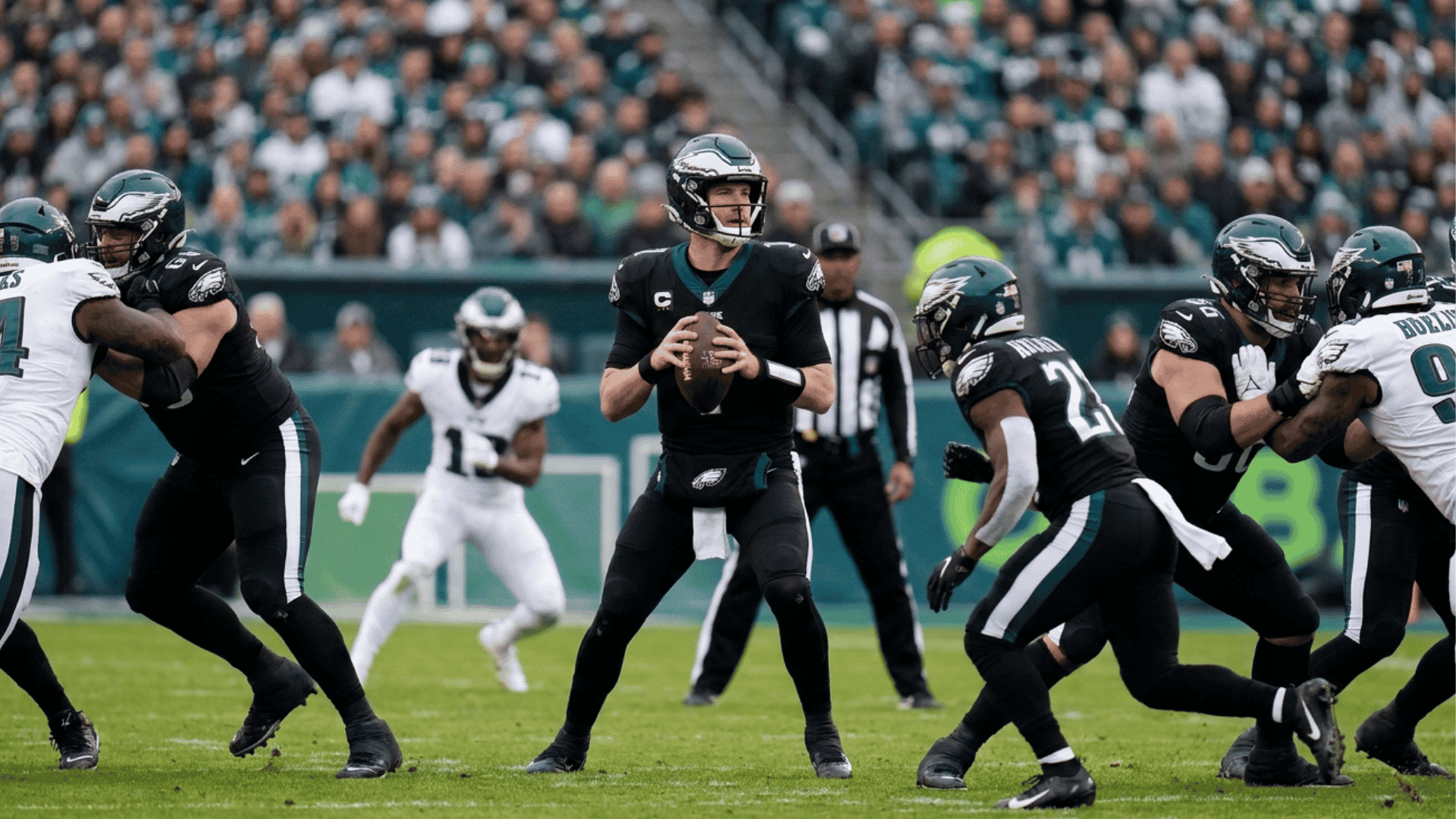 quarterback holding the football in the pocket while teammates block defenders during a passing play