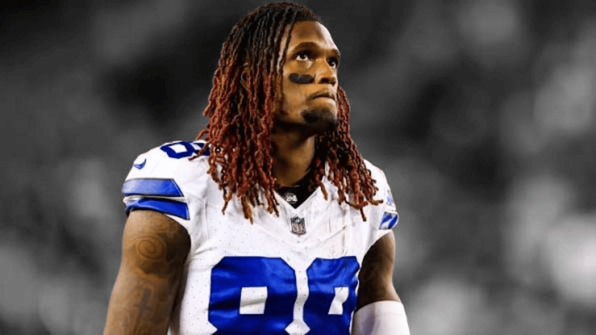 cowboys player number eighty eight ceedee lamb fantasy names looking upward before a football game