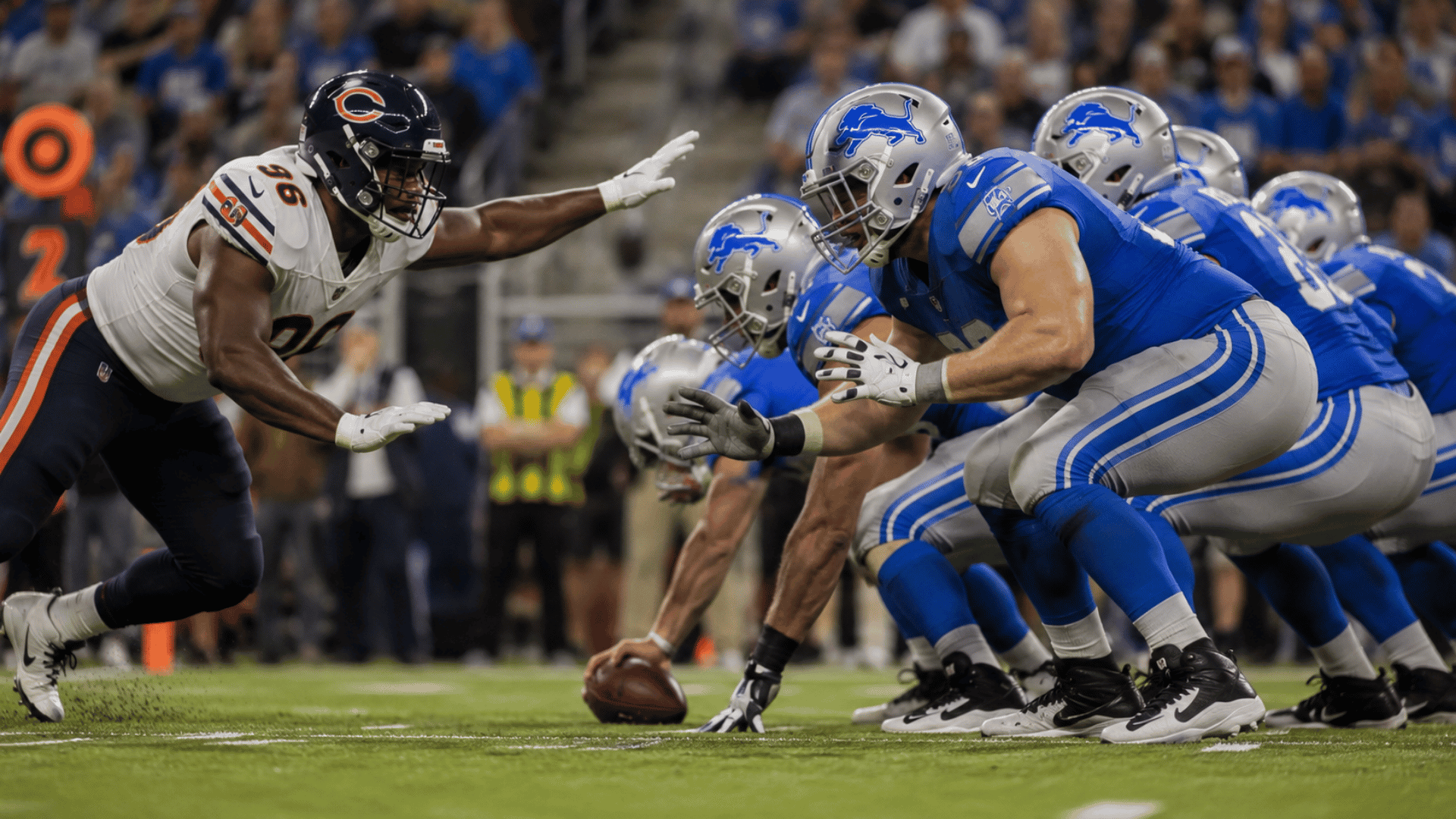 defender crosses the neutral zone as an offensive tackle reacts before the football is snapped