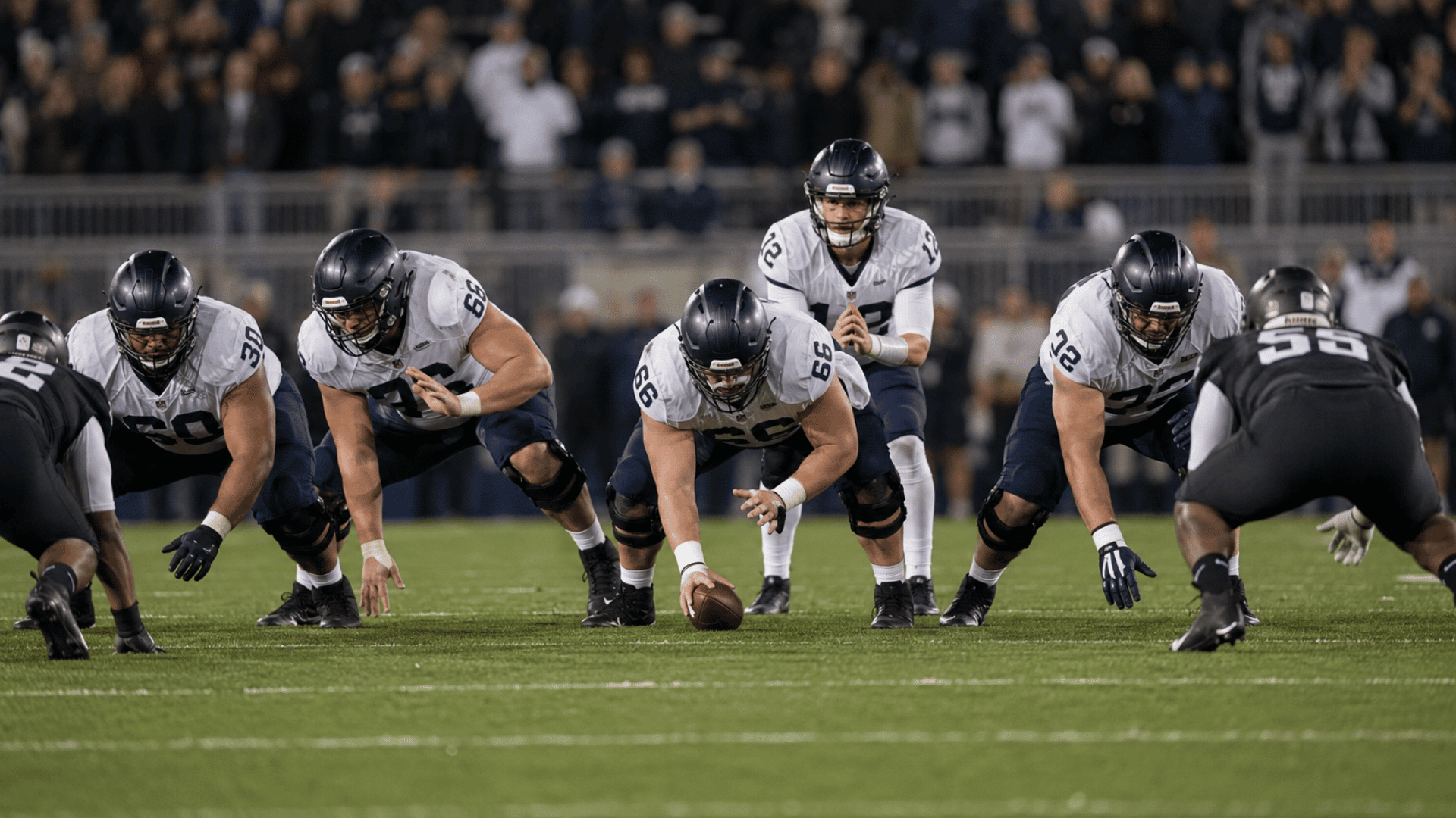 offensive linemen set at the line as one blocker begins moving early before the football is snapped