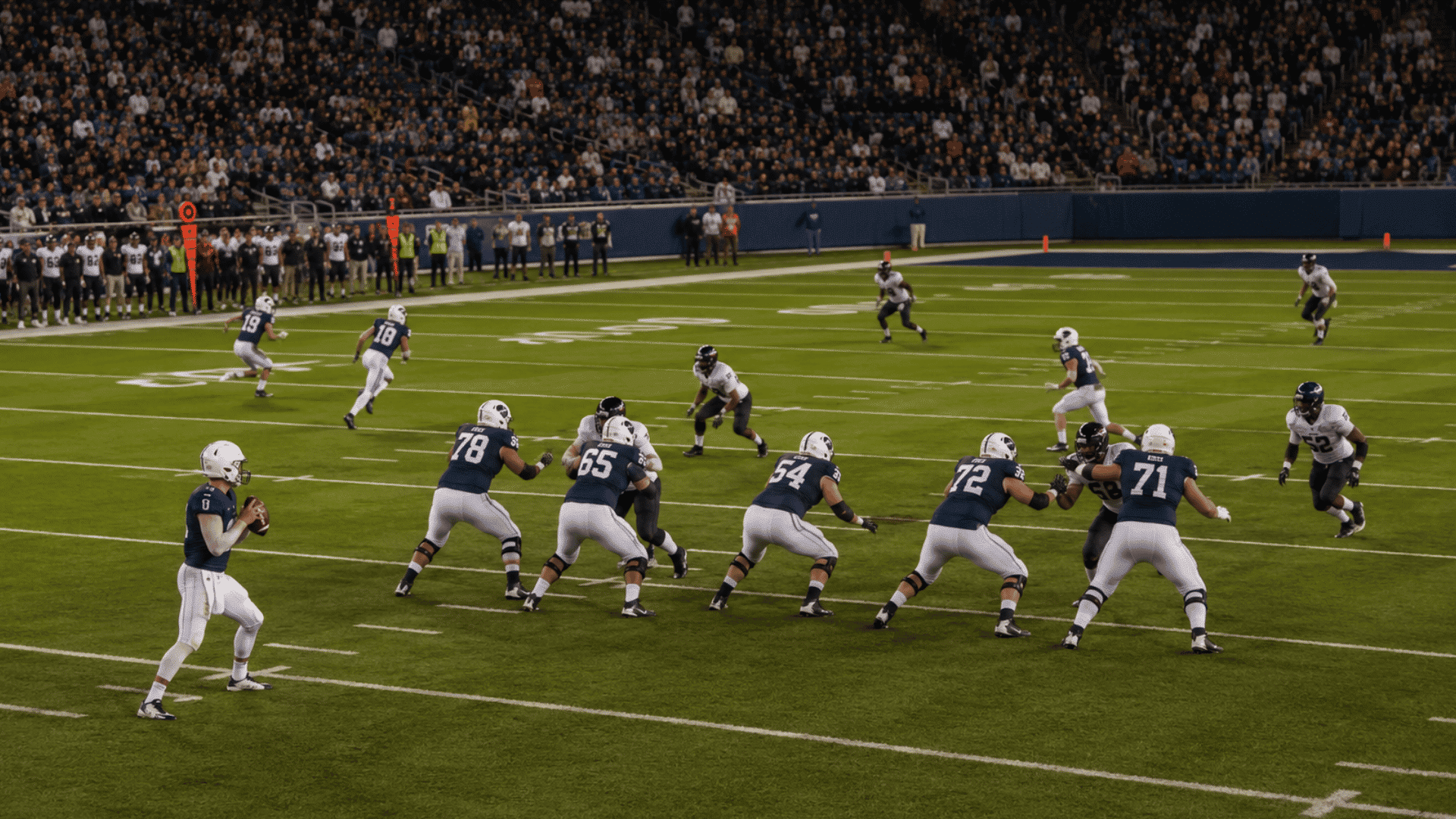 american football quarterback holds the ball behind the line as receivers and defenders move downfield
